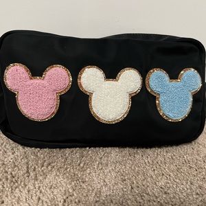 Stoney Clover Lane small pouch with Mickey patches. Never used.